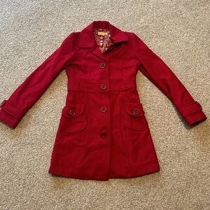 Red coat.  XXS